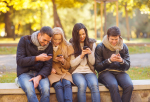 shutterstock_159680132-people-with-smartphones-300x204